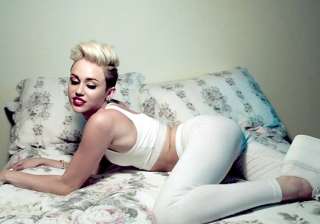 miley cyrus wants to leak her own songs - India TV miley cyrus wants to leak her own songs - India TV