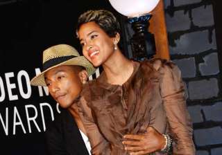 rapper pharrell williams marries longtime... rapper pharrell williams marries longtime...