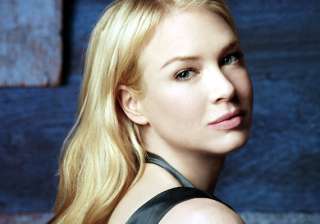 renee zellweger keen to adopt - India TV renee zellweger keen to adopt - India TV