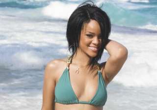 rihanna s charity for wolves see pics - India TV rihanna s charity for wolves see pics - India TV