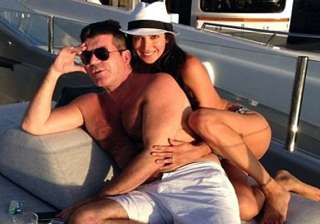simon cowell to give pregnant lover a mansion -... simon cowell to give pregnant lover a mansion -...