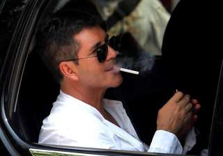 smoking always on simon cowell s mind - India TV smoking always on simon cowell s mind - India TV