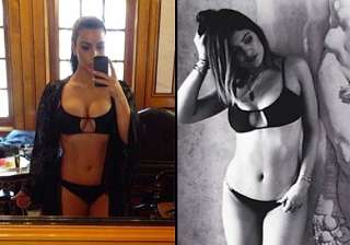 kim kardashian flaunts squeezed assets in a tiny... kim kardashian flaunts squeezed assets in a tiny...