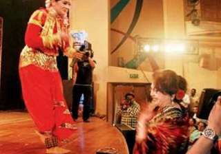 helen touches sudha chandran s feet after... helen touches sudha chandran s feet after...