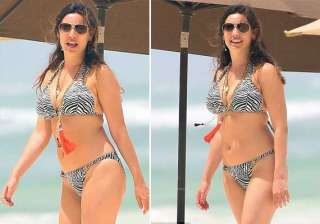 kelly brook soaks up the sun in greece view pics... kelly brook soaks up the sun in greece view pics...