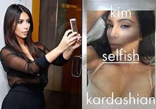kim kardashian flaunts cleavage for selfish -... kim kardashian flaunts cleavage for selfish -...