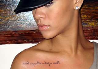 just got inked rihanna flaunts her new tattoo... just got inked rihanna flaunts her new tattoo...