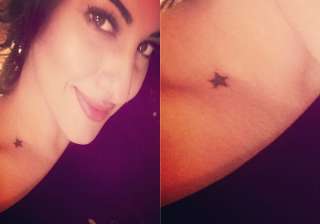 sonakshi sinha gets a star tattoo inked on her... sonakshi sinha gets a star tattoo inked on her...