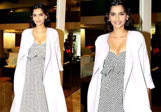 sonam kapoor flaunts her cleavage looks dewy hot... sonam kapoor flaunts her cleavage looks dewy hot...