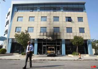 assailants attack microsoft hq in athens - India... assailants attack microsoft hq in athens - India...