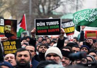 at least 7 killed as thousands defy assad in... at least 7 killed as thousands defy assad in...