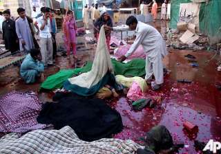 taliban twin bombers kill 42 at shrine 100... taliban twin bombers kill 42 at shrine 100...