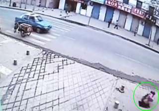 girl on phone accidentally falls through hole in... girl on phone accidentally falls through hole in...