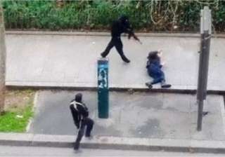 charlie hebdo attack cop killed on pavement... charlie hebdo attack cop killed on pavement...