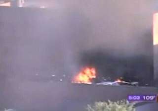 plane crashes into building at phoenix airport in... plane crashes into building at phoenix airport in...