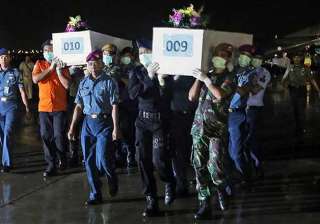 some airasia victims found belted in seats -... some airasia victims found belted in seats -...