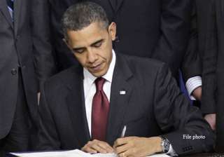barack obama signs terrorism insurance renewal -... barack obama signs terrorism insurance renewal -...