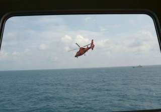 searchers close in on airasia jet s black box as... searchers close in on airasia jet s black box as...