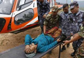 helicopters ferry injured from nepal villages... helicopters ferry injured from nepal villages...