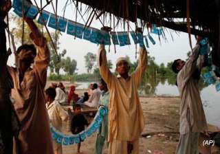 pakistan tones down i day celebrations as floods... pakistan tones down i day celebrations as floods...