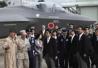 japan cabinet okays record military budget with... japan cabinet okays record military budget with...