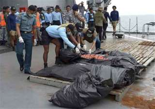 australian experts help identify airasia victims... australian experts help identify airasia victims...