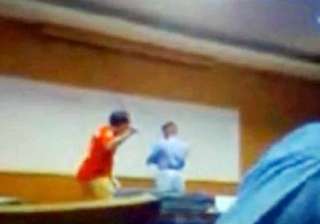 thai teacher beats 40 students with cane wrapped... thai teacher beats 40 students with cane wrapped...