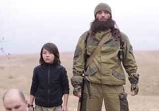 isis video shows child executing two russian... isis video shows child executing two russian...