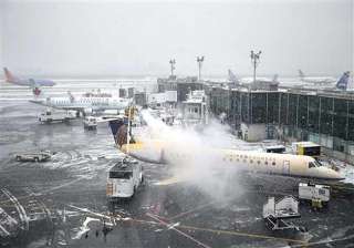 thousands of flights canceled as us braces for... thousands of flights canceled as us braces for...