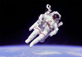spacewalking astronauts capture footage of their... spacewalking astronauts capture footage of their...