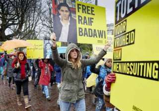 worldwide outrage as saudi blogger raif badawi... worldwide outrage as saudi blogger raif badawi...