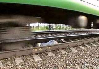 russian girl lies on tracks as train speeds over... russian girl lies on tracks as train speeds over...