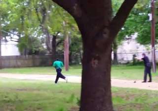us white cop shoots dead black man as he tried to... us white cop shoots dead black man as he tried to...