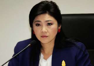 former thai pm shinawatra faces corruption... former thai pm shinawatra faces corruption...