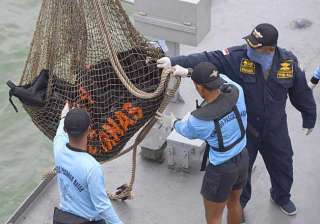 airasia crash searchers may have located tail of... airasia crash searchers may have located tail of...