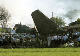 indonesia military plane crashes into houses... indonesia military plane crashes into houses...