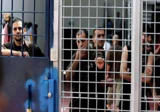 palestinian prisoners end hunger strike in... palestinian prisoners end hunger strike in...