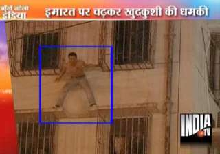 police abseil in to save suicidal man on window... police abseil in to save suicidal man on window...