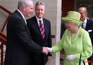 queen in historic handshake with her cousin s... queen in historic handshake with her cousin s...