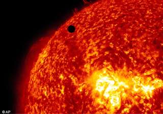 eyes turn skyward as venus travels across the sun... eyes turn skyward as venus travels across the sun...
