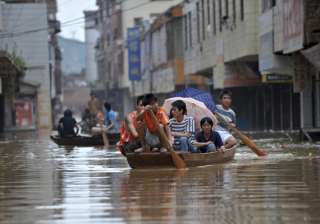 rescuers continue relief work in flood hit... rescuers continue relief work in flood hit...