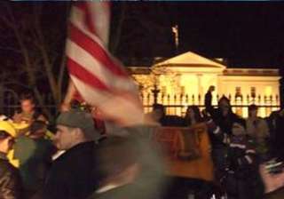 smoke bomb tossed over white house fence - India... smoke bomb tossed over white house fence - India...