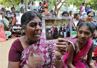 sri lanka arrests tamil woman who pressed case... sri lanka arrests tamil woman who pressed case...