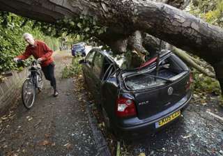 storm batters britain france disrupting normal... storm batters britain france disrupting normal...