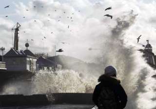 storms wreak havoc in britain leave two dead -... storms wreak havoc in britain leave two dead -...