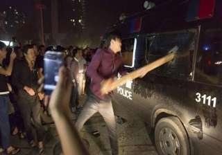 thousands stage protest in flood hit chinese city... thousands stage protest in flood hit chinese city...