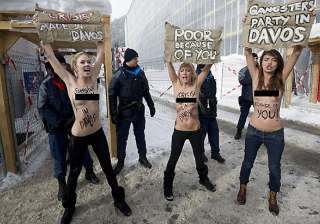 topless ukrainian women stage protest at world... topless ukrainian women stage protest at world...