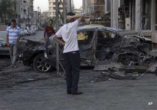 wave of bomb blasts rock iraqi capital killing 30... wave of bomb blasts rock iraqi capital killing 30...