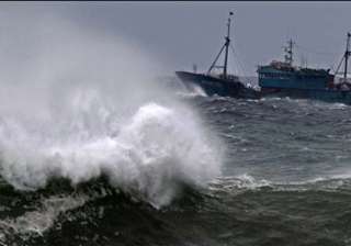 74 missing as south china sea typhoon sinks boats... 74 missing as south china sea typhoon sinks boats...