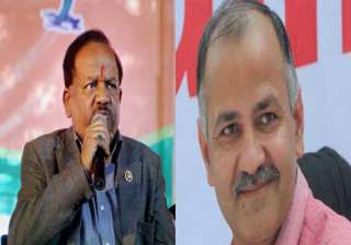 aap mlas stage protest outside harsh vardhan s... aap mlas stage protest outside harsh vardhan s...